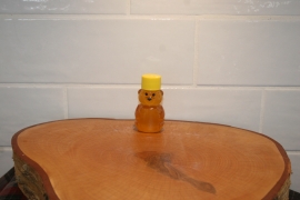 K and J Apiaries Liquid Raw Honey Bear in a 2 ounce squeeze bottle
